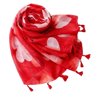Red scarf with white heart patterns and sparkling lurex details and tassel trim