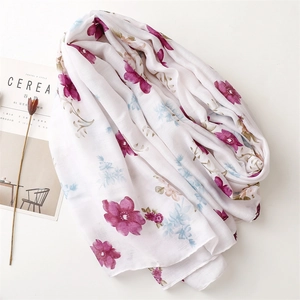 Elegant cotton linen scarf with purple floral print and fringe, stylish beach shawl