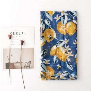 Navy blue cotton linen scarf with large lemon floral print and bees for summer travel