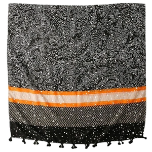Lightweight scarf with paisley patterns, orange stripes and black decorative tassels
