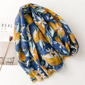 Navy blue cotton linen scarf with bright lemon and floral print with frayed edges