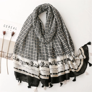 Eleganter schwarz-weißer Schal mit Blumenmuster und weichen Quasten für Damen