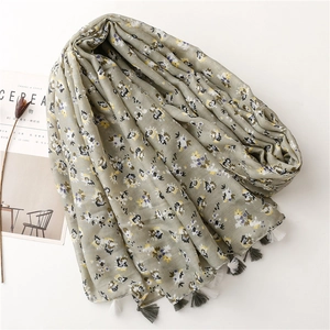 Elegant green floral cotton linen scarf for women with tassels and meadow flower patterns