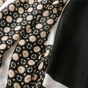 Macro detail of geometric octagon print and twill texture on soft cotton linen scarf