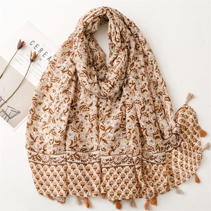 Floral cotton linen scarf with soft tassels and vintage print on white background