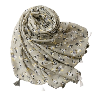 Light green linen-feel scarf with small floral prints and elegant fringe tassels