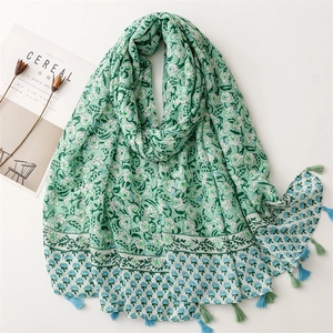 Mint green floral cotton scarf with soft tassels and elegant spring primrose pattern
