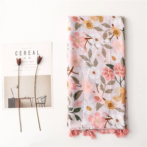 Pink floral bohemian scarf with tassels and light fabric for summer beach vacation