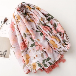 Pink bohemian floral sun protection shawl with tassel edges for beach vacations