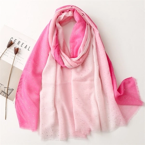 Pink gradient scarf with silver glitter and frayed edges on white background