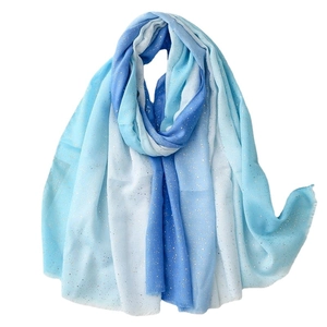 Elegant gradient blue scarf with gold starlight shimmer and delicate frayed edges