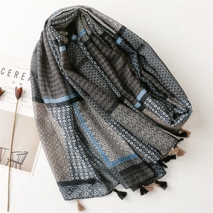 Geometric print cotton linen shawl with tassels and leopard pattern in blue and grey