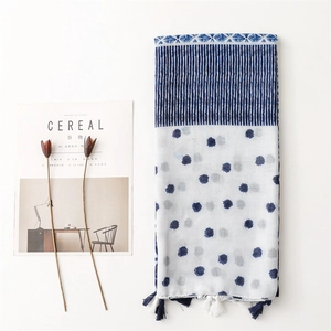 Blue and white patterned cotton linen scarf with stripes, dots and decorative tassels