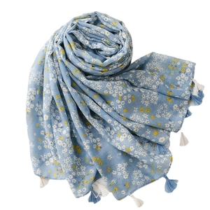 Light blue floral cotton scarf with long tassels for sun protection and travel