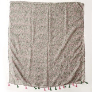 Light pink cotton linen scarf with green floral print and colorful fringe tassels