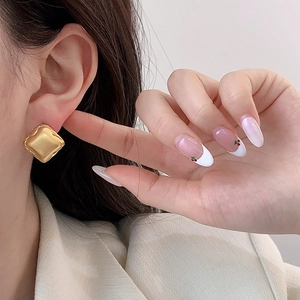 Minimalist geometric square earrings in gold plated copper with matte brushed finish