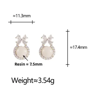 Detailed view of bowknot chalcedony earrings with measurements and resin stone info
