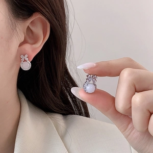 Elegant bow stud earrings with chalcedony bead and micro-set zircon in silver finish