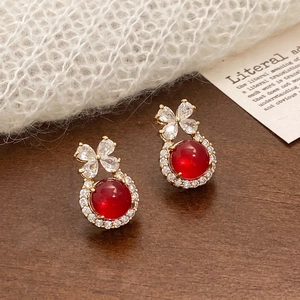 Elegant chalcedony bow earrings with red gemstone and cubic zirconia in gold setting