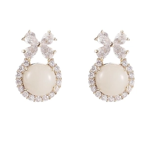 Elegant gold bow earrings with chalcedony and zircon inlay for a vintage feminine style