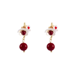 Vintage gold drop earrings with white clover flowers and dark red pearl beads