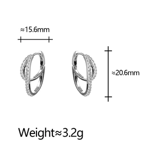 Detail view of double-layered twisted silver earrings with cubic zirconia, size 15.6x20.6mm