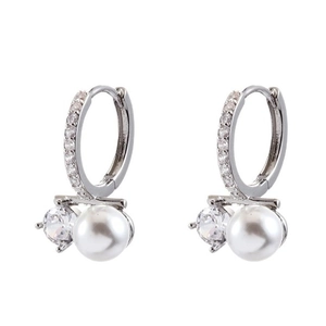 Elegant silver pearl earrings with sparkling cubic zirconia on a white background