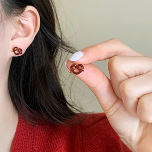French vintage pretzel stud earrings with brown enamel finish and gold metal accents