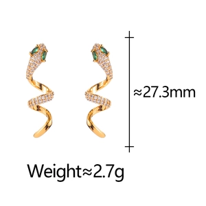 Exquisite gold snake earrings with emerald green eyes and white crystal details
