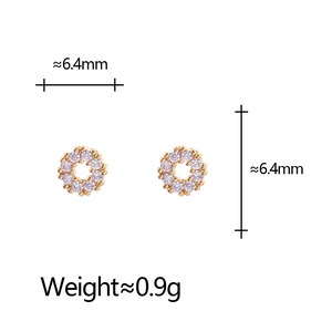 Detail of mini gold hoop earrings with purple stones, 6.4mm diameter and 0.9g weight