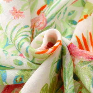 Detailed close-up of floral bird print on lightweight breathable cotton linen scarf