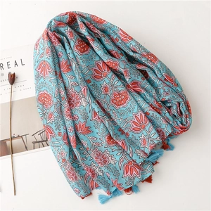 Floral cotton linen scarf with coral lily prints and tassels on white background