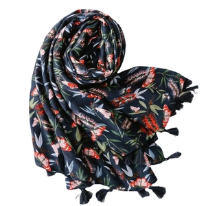Navy linen scarf with red floral and butterfly prints and decorative tassel edges