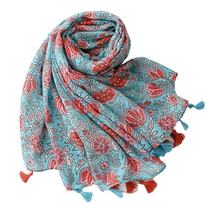 Light blue floral cotton linen scarf with orange lily prints and decorative tassels