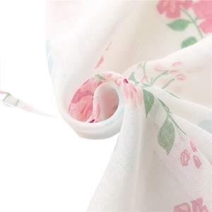 Floral cotton linen scarf with pink blossoms and green leaves with tassels for women