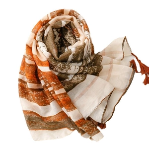 Bohemian striped shawl with orange and green patterns and decorative tassels