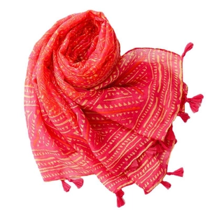 Bohemian style red geometric print scarf with tassels on white background