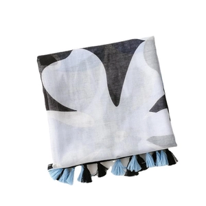 Lightweight tropical leaf print cotton linen shawl with blue fringe tassels