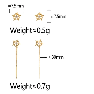 Detailsicht der goldenen Schneeflocken-Ohrringe mit 7,5-mm-Steckern und 30-mm-Ohrketten