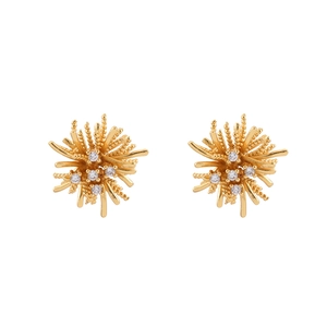 Elegant gold firework stud earrings with sparkling cubic zirconia in a radial design