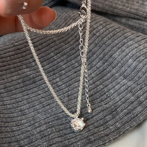 Silver star necklace with sparkling zircon pendant and textured chain for women