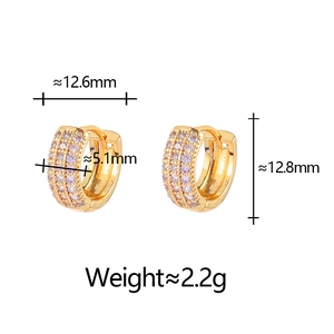 Macro view of gold hoop earrings with micro-paved cubic zirconia and size dimensions