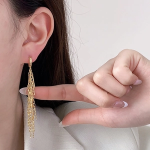 Elegant gold long chain tassel earrings with multi-layered fringe design for a stylish look