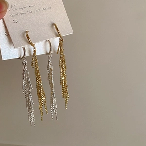 Elegant long metal tassel earrings in gold and silver finish with cascading fine chains