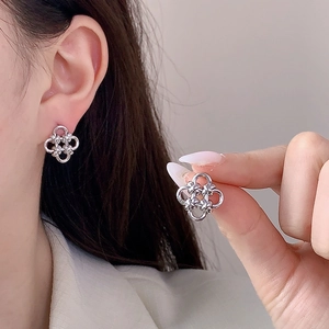 Silver geometric clover knot earrings for women with elegant hollow flower design