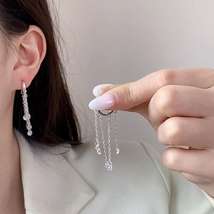 Silver tassel chain earrings with sparkling zircon pendants and a polished metallic finish
