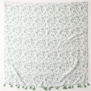 Elegant white linen feel scarf with green willow leaf prints and tassel fringe