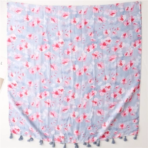Light blue floral cotton linen scarf with pink orchid patterns and soft grey fringes