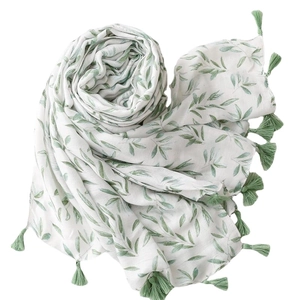 Elegant white linen feel scarf with green leaf print and tassels for women