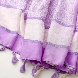 Close-up of purple mandala print scarf with soft fabric texture and fringe details